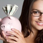 Girl Holding Piggy Bank